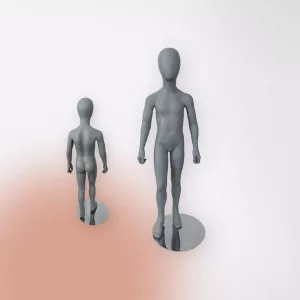 Maniquí niña con cabeza sin rostro gris