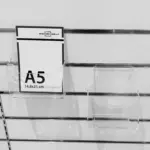 Expositor folletos DIN A5, sobremesa, pared y sistema lamas